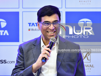 Indian chess grandmaster Viswanathan Anand speaks during a post-match press conference at the 6th TATA Steel Chess India Tournament at Dhono...