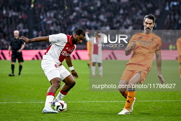 AFC Ajax Amsterdam legend Ryan Babel and Real Madrid CF legend Fernando Sanz participate in the match between Ajax Legends and Real Madrid L...