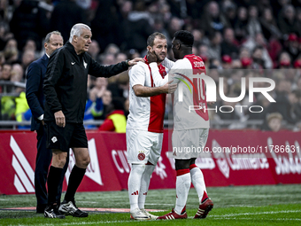 Roelof Luinge, AFC Ajax Amsterdam legend player Rafael van der Vaart, and AFC Ajax Amsterdam legend player Clarence Seedorf participate in t...