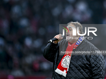 Folk singer Peter Beense performs during the match between Ajax Legends and Real Madrid Legends at the Johan Cruijff ArenA for the Dutch Ere...