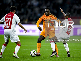 Real Madrid CF legend Clarence Seedorf and AFC Ajax Amsterdam legend Eyong Enoh participate in the match between Ajax Legends and Real Madri...