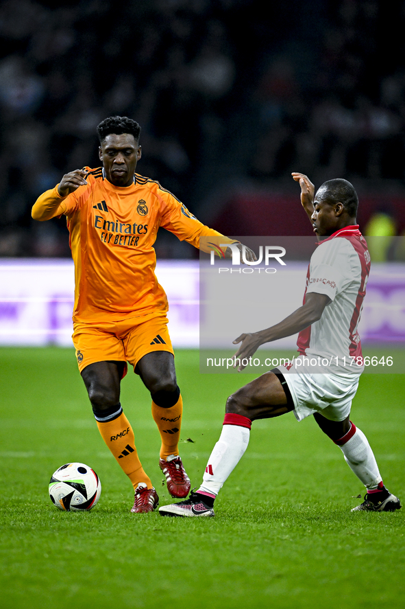 Real Madrid CF legend Clarence Seedorf and AFC Ajax Amsterdam legend Eyong Enoh participate in the match between Ajax Legends and Real Madri...