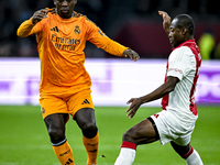 Real Madrid CF legend Clarence Seedorf and AFC Ajax Amsterdam legend Eyong Enoh participate in the match between Ajax Legends and Real Madri...