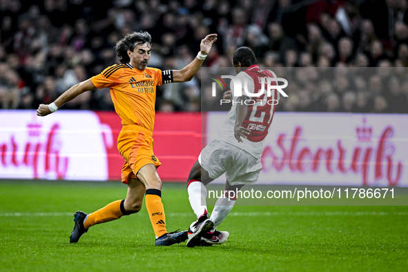 Real Madrid CF legend player Jose Amavisca and AFC Ajax Amsterdam legend player Eyong Enoh participate in the match between Ajax Legends and...