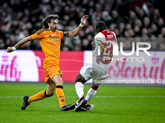 Real Madrid CF legend player Jose Amavisca and AFC Ajax Amsterdam legend player Eyong Enoh participate in the match between Ajax Legends and...