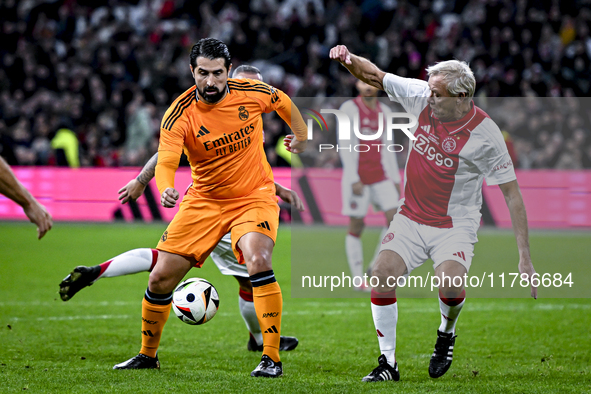 Real Madrid CF legend player Ruben de la Red and AFC Ajax Amsterdam legend player Dick Schoenaker participate in the match between Ajax Lege...