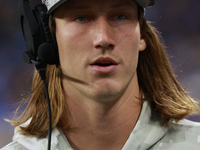 DETROIT,MICHIGAN-November 17: Jacksonville Jaguars quarterback Trevor Lawrence (16) looks on from the sideline during the first half of an N...