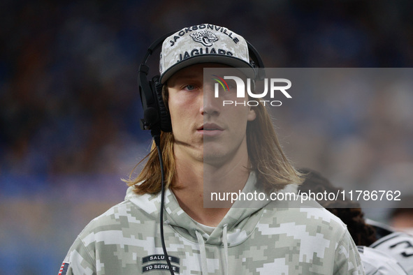 DETROIT,MICHIGAN-November 17: Jacksonville Jaguars quarterback Trevor Lawrence (16) looks on from the sideline during the first half of an N...