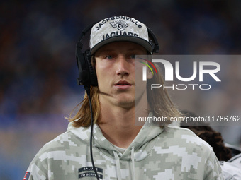 DETROIT,MICHIGAN-November 17: Jacksonville Jaguars quarterback Trevor Lawrence (16) looks on from the sideline during the first half of an N...