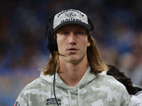 DETROIT,MICHIGAN-November 17: Jacksonville Jaguars quarterback Trevor Lawrence (16) looks on from the sideline during the first half of an N...