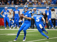 DETROIT,MICHIGAN-November 17: Detroit Lions quarterback Jared Goff (16) looks to pass during the first half of an NFL football game between...