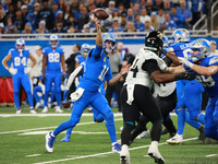 DETROIT,MICHIGAN-November 17: Detroit Lions quarterback Jared Goff (16) throws a pass during the first half of an NFL football game between...