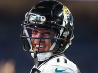 DETROIT,MICHIGAN-NOVEMBER17: Wide receiver Parker Washington (11) of the Jacksonville Jaguars warms up ahead of a game between the Detroit L...