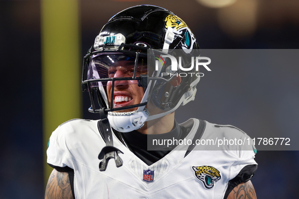 DETROIT,MICHIGAN-NOVEMBER17: Wide receiver Parker Washington (11) of the Jacksonville Jaguars warms up ahead of a game between the Detroit L...