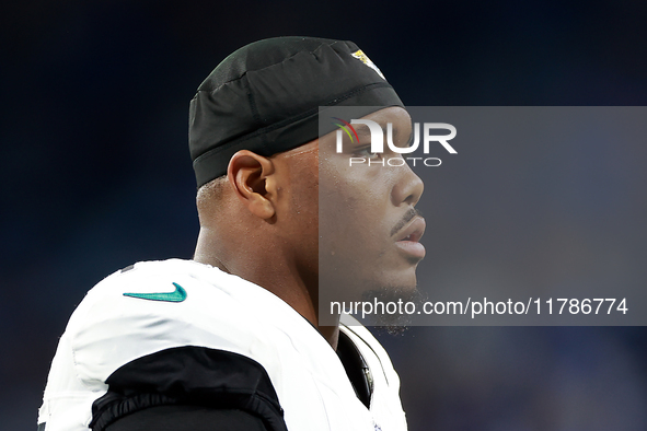 DETROIT,MICHIGAN-NOVEMBER17: Defensive end Travon Walker (44) of the Jacksonville Jaguars warms up ahead of a game between the Detroit Lions...