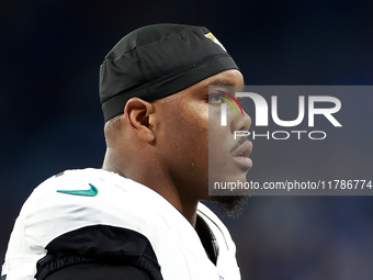 DETROIT,MICHIGAN-NOVEMBER17: Defensive end Travon Walker (44) of the Jacksonville Jaguars warms up ahead of a game between the Detroit Lions...