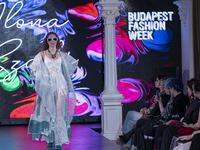 A model presents a creation by Hungarian designer Ilona Szabo during Budapest Fashion Week in Budapest, Hungary, on November 15, 2024, at Ha...