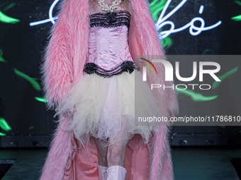 A model presents a creation by Hungarian designer Ilona Szabo during Budapest Fashion Week in Budapest, Hungary, on November 15, 2024, at Ha...