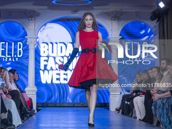 A model presents a creation by French designer Eli.B during Budapest Fashion Week in Budapest, Hungary, on November 15, 2024, at Hall of Cit...