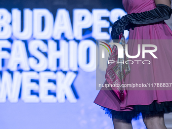 A model presents a creation by French designer Eli.B during Budapest Fashion Week in Budapest, Hungary, on November 15, 2024, at Hall of Cit...