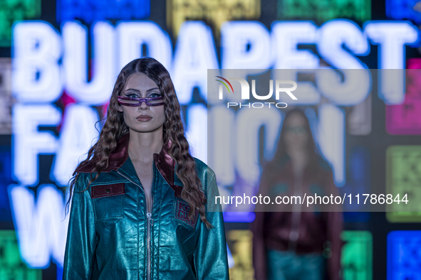 A model presents a creation by Hungarian designer and event organizer Kenguru during Budapest Fashion Week in Budapest, Hungary, on November...