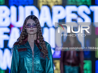 A model presents a creation by Hungarian designer and event organizer Kenguru during Budapest Fashion Week in Budapest, Hungary, on November...