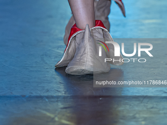 A model presents a creation by Hungarian designer and event organizer Kenguru during Budapest Fashion Week in Budapest, Hungary, on November...