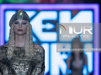 A model presents a creation by Hungarian designer and event organizer Kenguru during Budapest Fashion Week in Budapest, Hungary, on November...