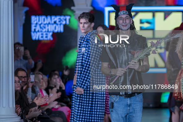 Hungarian designer and organizer Kenguru concludes the event at Budapest Fashion Week in Budapest, Hungary, on November 15, 2024, at the Hal...