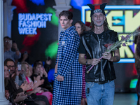 Hungarian designer and organizer Kenguru concludes the event at Budapest Fashion Week in Budapest, Hungary, on November 15, 2024, at the Hal...