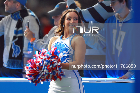 DETROIT,MICHIGAN-NOVEMBER17:  A cheerleader cheers as players enter the field ahead of a game between the Detroit Lions and the Jacksonville...