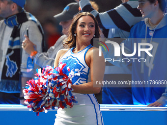 DETROIT,MICHIGAN-NOVEMBER17:  A cheerleader cheers as players enter the field ahead of a game between the Detroit Lions and the Jacksonville...