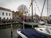 Sinterklaas and Black Petes arrive at the harbor of Middelharnis. The action group ''Kick Out Zwarte Piet'' (Black Pete) stages a protest in...