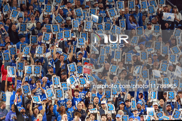 DETROIT,MICHIGAN-NOVEMBER17:  Fans hold third down signs in the stands during a game between the Detroit Lions and the Jacksonville Jaguars...