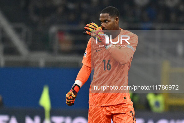 Mike Maignan (FRA) celebrates the goal of Adrien Rabiot (FRA) during the UEFA Nations League Matchday 6 match between Italy and France at th...