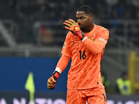 Mike Maignan (FRA) celebrates the goal of Adrien Rabiot (FRA) during the UEFA Nations League Matchday 6 match between Italy and France at th...