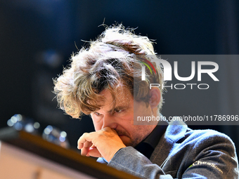 Norwegian GM Magnus Carlsen plays chess during the 6th TATA Steel Chess India Tournament at Dhono Dhanyo Auditorium in Kolkata, India, on No...