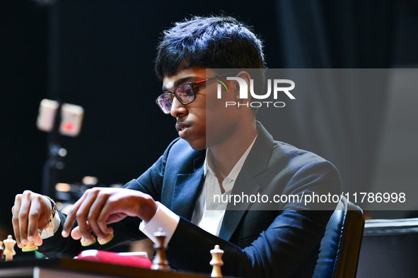 Indian GM Rameshbabu Praggnanandhaa plays chess during the 6th TATA Steel Chess India Tournament at Dhono Dhanyo Auditorium in Kolkata, Indi...