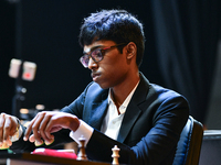 Indian GM Rameshbabu Praggnanandhaa plays chess during the 6th TATA Steel Chess India Tournament at Dhono Dhanyo Auditorium in Kolkata, Indi...