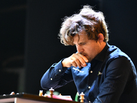 Norwegian GM Magnus Carlsen plays chess during the 6th TATA Steel Chess India Tournament at Dhono Dhanyo Auditorium in Kolkata, India, on No...