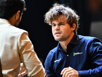 Norwegian GM Magnus Carlsen plays chess during the 6th TATA Steel Chess India Tournament at Dhono Dhanyo Auditorium in Kolkata, India, on No...