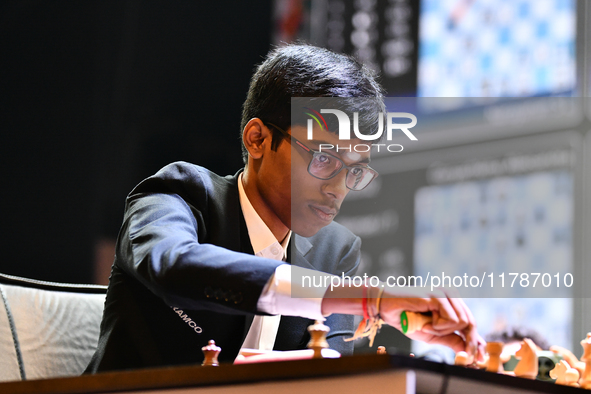 Indian GM Rameshbabu Praggnanandhaa plays chess during the 6th TATA Steel Chess India Tournament at Dhono Dhanyo Auditorium in Kolkata, Indi...