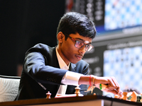 Indian GM Rameshbabu Praggnanandhaa plays chess during the 6th TATA Steel Chess India Tournament at Dhono Dhanyo Auditorium in Kolkata, Indi...