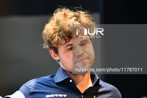 Norwegian GM Magnus Carlsen plays chess during the 6th TATA Steel Chess India Tournament at Dhono Dhanyo Auditorium in Kolkata, India, on No...