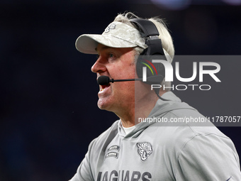 DETROIT,MICHIGAN-NOVEMBER 7:  Jacksonville Jaguars head coach Doug Pederson talks with an official after a call during a game between the De...