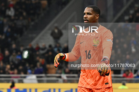 Mike Maignan (FRA) participates in the UEFA Nations League Matchday 6 match between Italy and France at the San Siro Stadium in Milan, Italy...