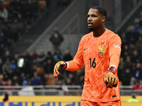 Mike Maignan (FRA) participates in the UEFA Nations League Matchday 6 match between Italy and France at the San Siro Stadium in Milan, Italy...