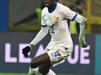 Randal Kolo Muani (FRA) is in action during the UEFA Nations League Matchday 6 match between Italy and France at the San Siro Stadium in Mil...