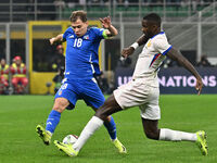 Nicolo Barella (ITA) and William Saliba (FRA) are in action during the UEFA Nations League Matchday 6 match between Italy and France at the...