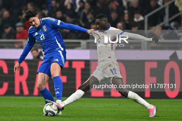 Alessandro Bastoni (ITA) and Randal Kolo Muani (FRA) are in action during the UEFA Nations League Matchday 6 match between Italy and France...